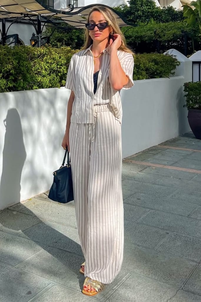 Kosovare-Asllani-white-striped-suit